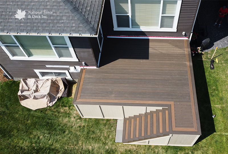 Trex Coastal Bluff deck with Toasted Sand accents and Smart Board skirting.